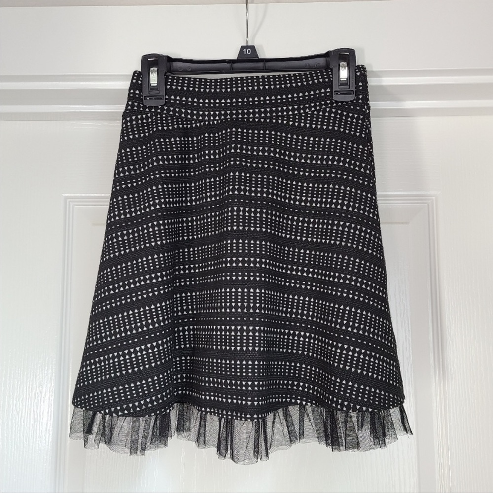 Black and white dot skirt with tule.